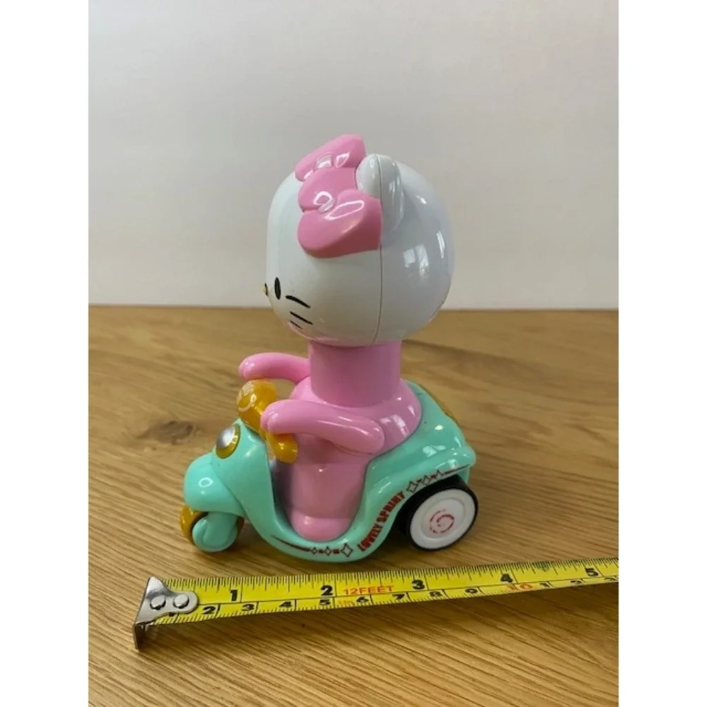 Hello Kitty Push Car‎ Scooter Kids OS Teal Pink Good Press Down Toy
